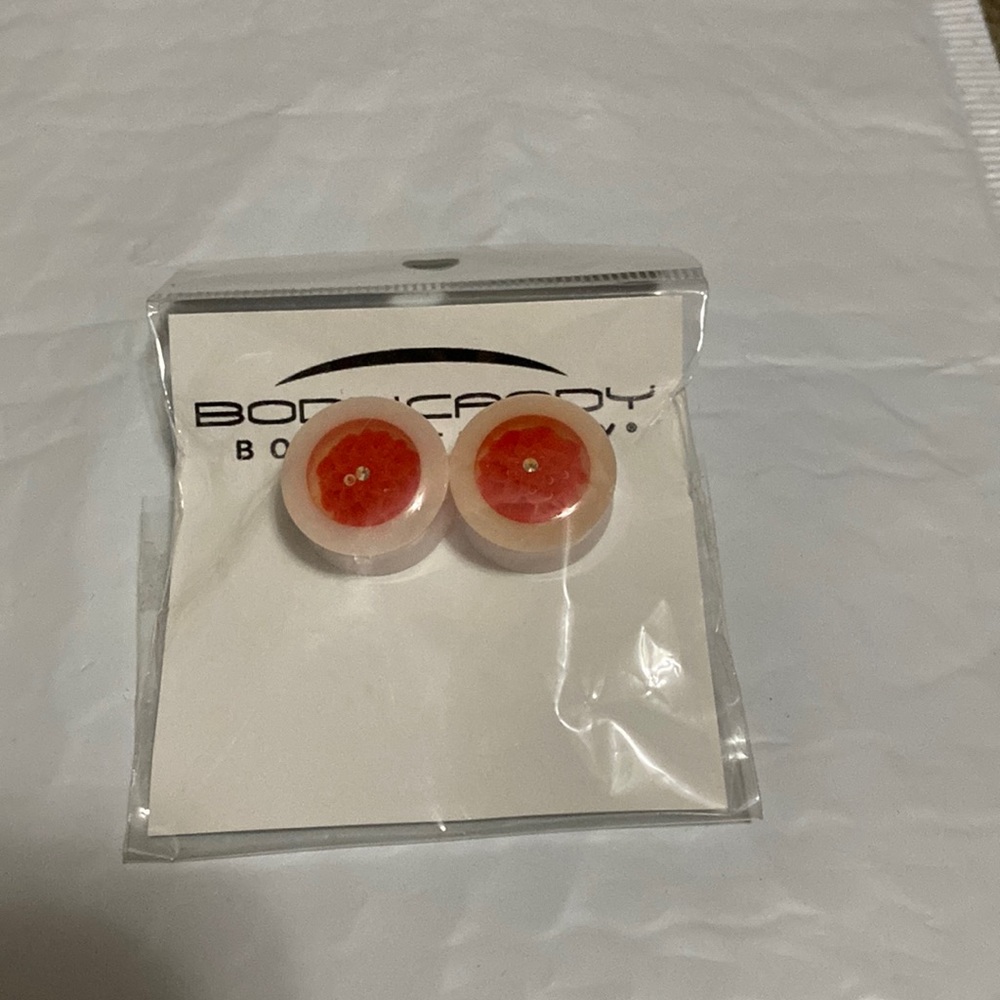 White acrylic red marigold saddle plug set 18mm. Brand new, never used